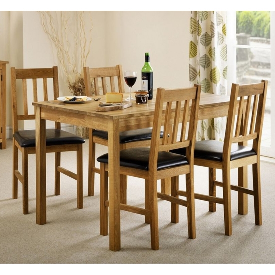 Coxmoor Rectangular Wooden Dining Table In Oak With 4 Chairs