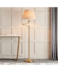 Stanford Swing Arm Beige Shade Floor Lamp In Antique Brass